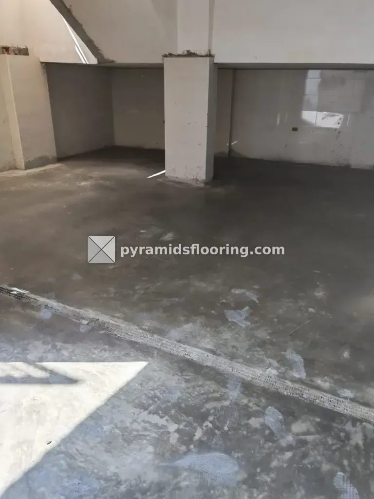 أرضية بدروم عمارة بعد التشطيب بالهليكوبتر